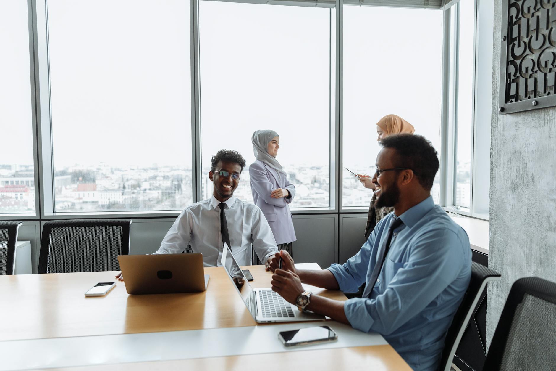 smiling colleagues in a meeting