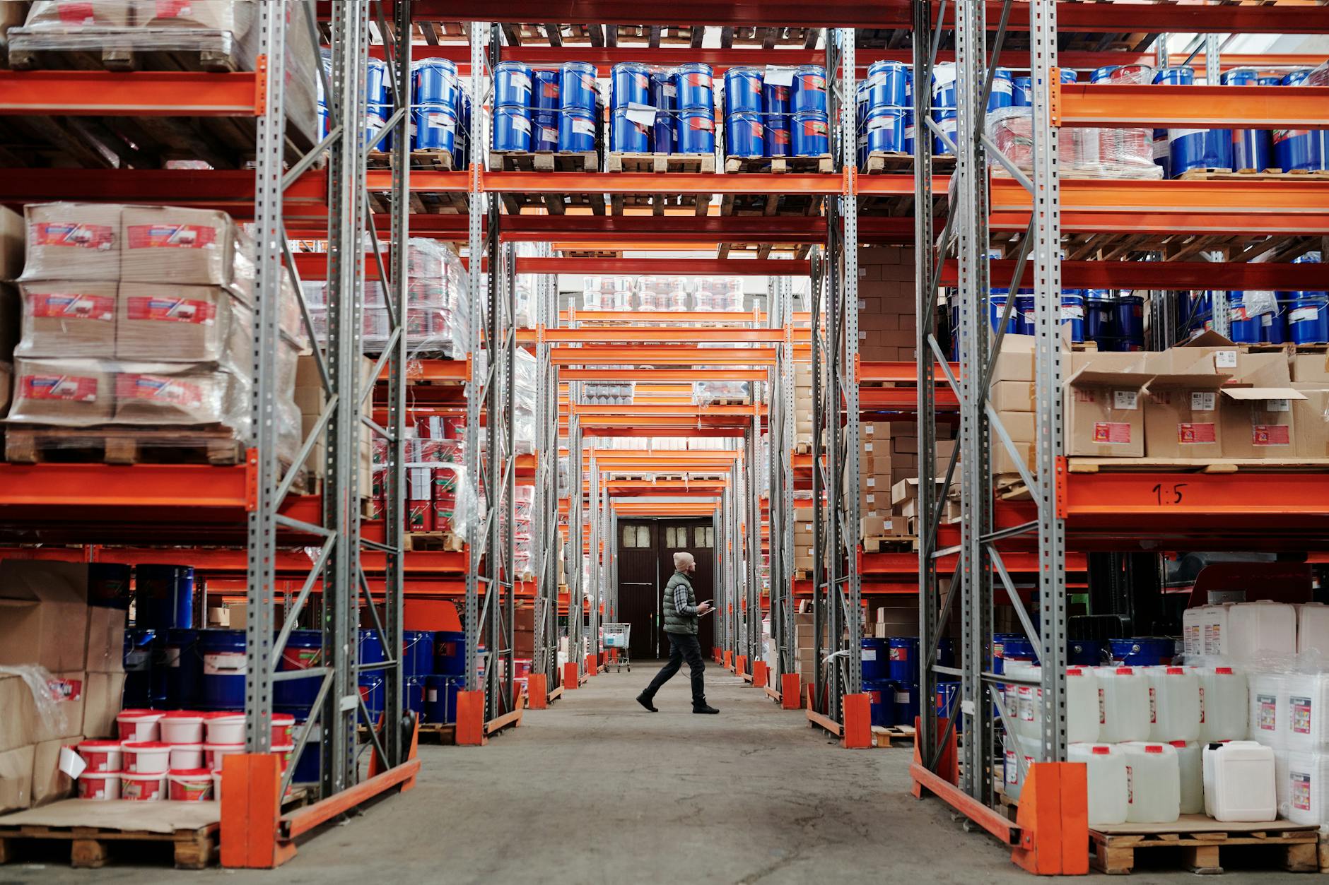 man walking in warehouse